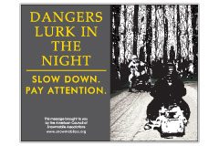Horizontal Poster of Snowmobilers and text ‘Dangers Lurk In The Night. Slow Down. Pay Attention'