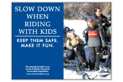 Horizontal Poster of Snowmobilers and text ‘Slow Down When Riding With Kids. Keep Them Safe. Make it Fun.'