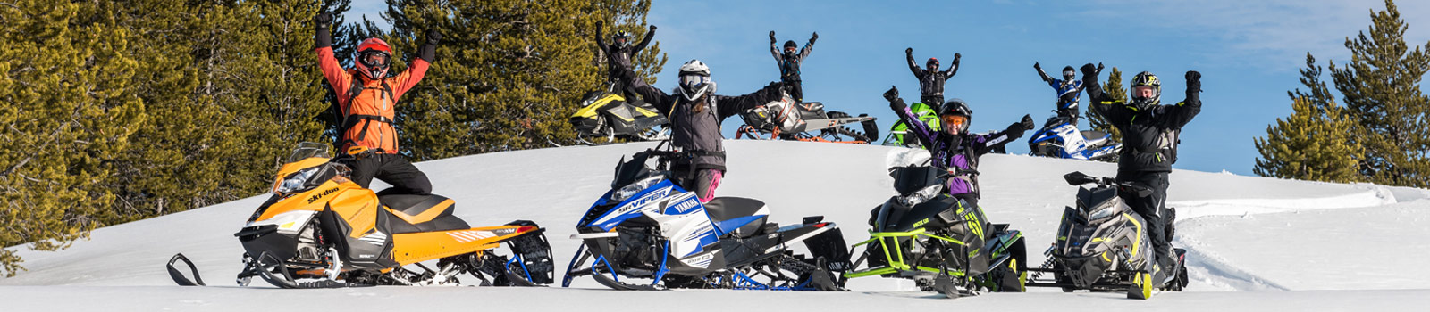 Snowmobilers having fun